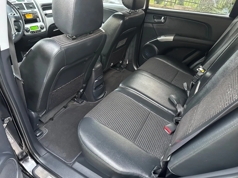 Kia Sportage 2.0i 4x4, снимка 10 - Автомобили и джипове - 52643665