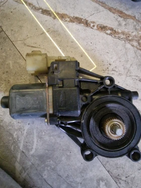 0130822618 Eл.Мотор за преден ляв прозорец  FORD FIESTA