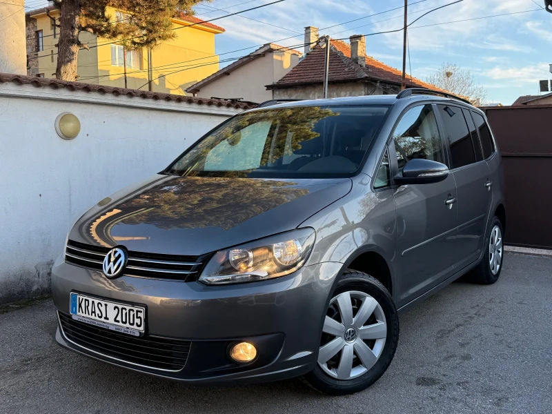 VW Touran 1.4TSI ECOFUEL NAVI - 11000 лв. - 61792540 | Car24.bg