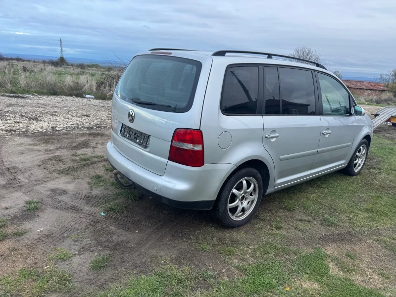 VW Touran 1.9 105 7-местен, снимка 7 - Автомобили и джипове - 52729006