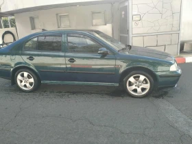 Skoda Octavia 1.6 i, снимка 11