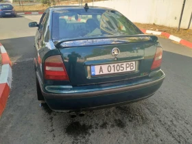 Skoda Octavia 1.6 i, снимка 6