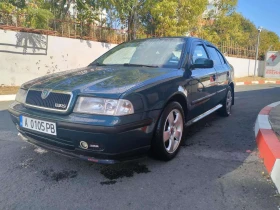 Skoda Octavia 1.6 i, снимка 8