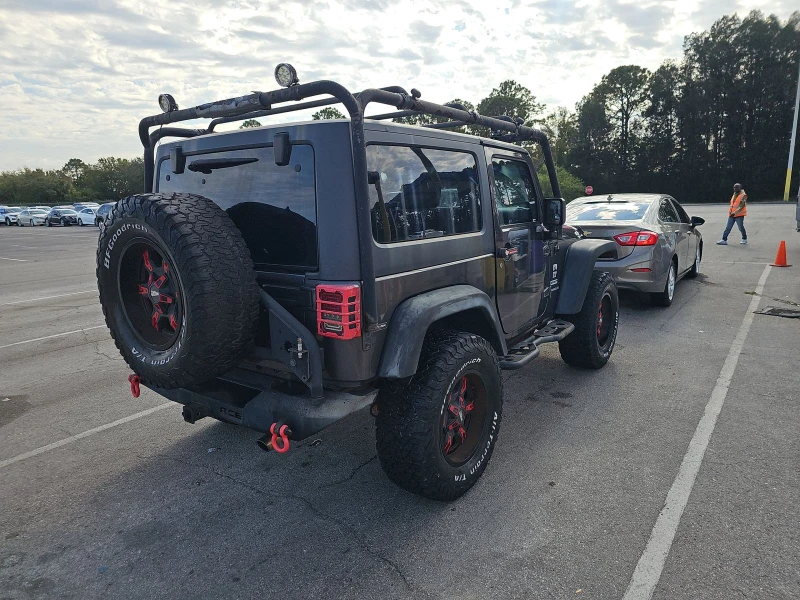 Jeep Wrangler 2014 Jeep Wrangler Sport, снимка 4 - Автомобили и джипове - 48808890