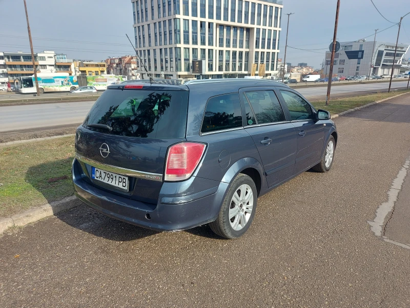 Opel Astra H Caravan, снимка 4 - Автомобили и джипове - 49235876