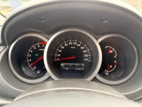 Suzuki Grand vitara 2.4i/ГАЗ/АВТОМАТ/KEYLESS, снимка 12