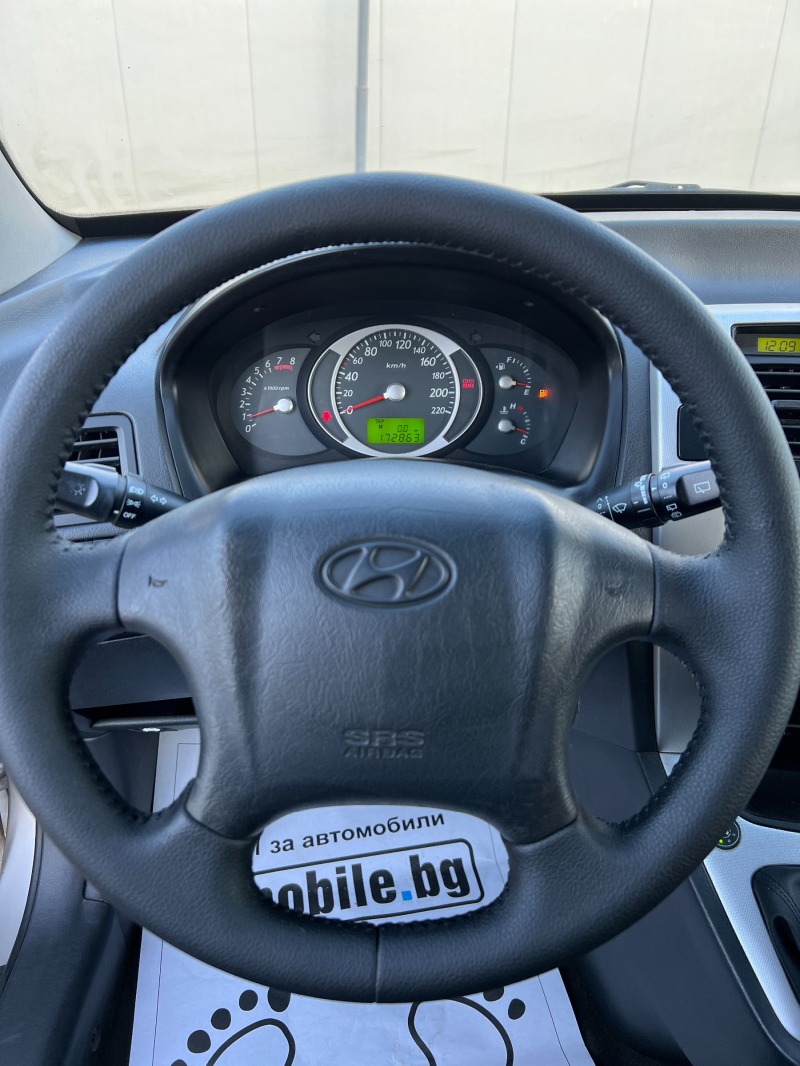 Hyundai Tucson 2.0i 16V, снимка 13 - Автомобили и джипове - 42179184