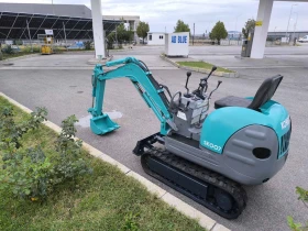 Багер Kobelco SK007