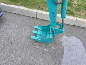      Kobelco SK007