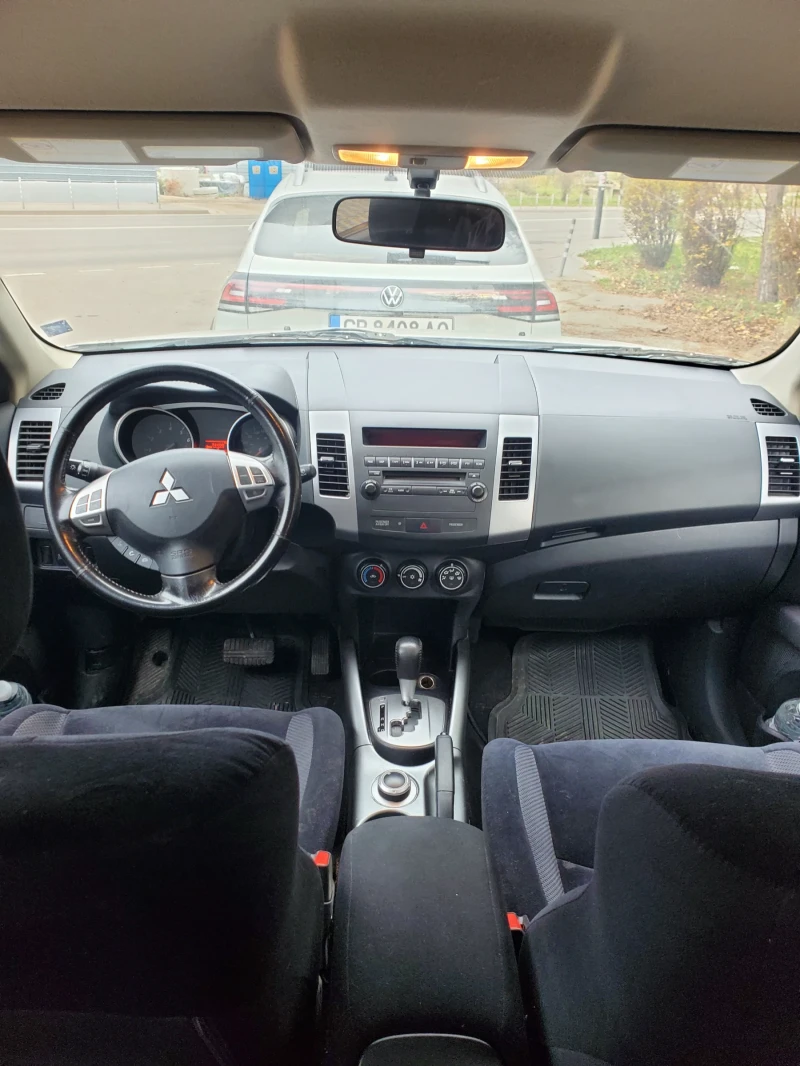 Mitsubishi Outlander 2.4i 4x4 Автоматик, снимка 16 - Автомобили и джипове - 52447786