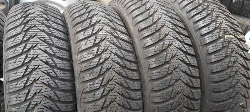 Гуми Зимни 155/65R14, снимка 1 - Гуми и джанти - 32559569