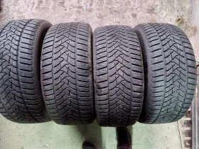 Гуми Зимни 245/45R18, снимка 1 - Гуми и джанти - 39116676