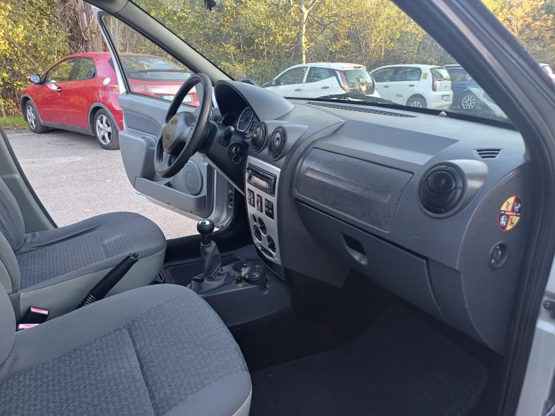 Dacia Logan 1.6i с газ, снимка 14 - Автомобили и джипове - 47712953