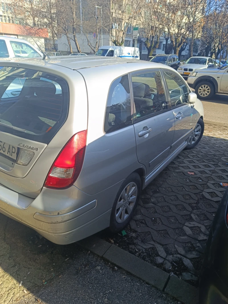 Suzuki Liana, снимка 4 - Автомобили и джипове - 48280164