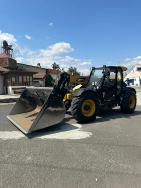 Телескопичен товарач Caterpillar TH337C, снимка 1