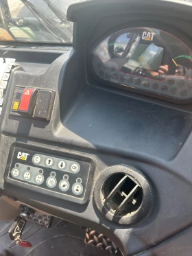 Телескопичен товарач Caterpillar TH337C, снимка 7
