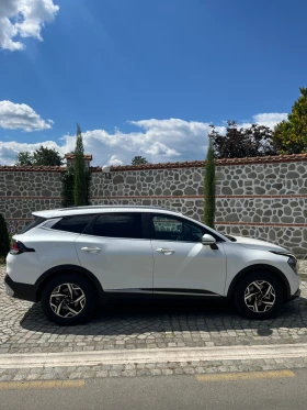 Kia Sportage 2.0Crdi* Бяла перла*  - 22900 € / 44788.51 лв. - 79040161 5