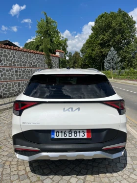 Kia Sportage 2.0Crdi* Бяла перла*  - 22900 € / 44788.51 лв. - 79040161 7