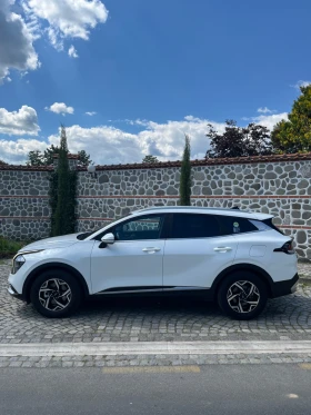 Kia Sportage 2.0Crdi* Бяла перла*  - 22900 € / 44788.51 лв. - 79040161 3