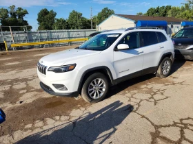 ������ Jeep Cherokee