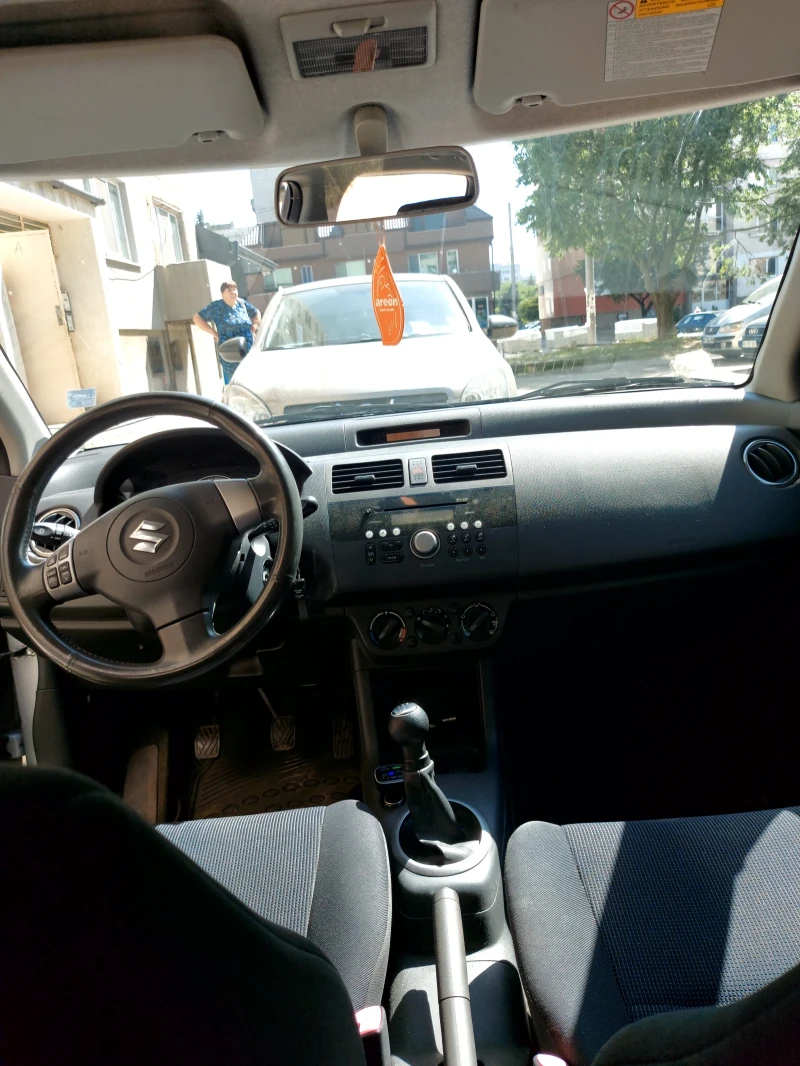 Suzuki Swift 1.3бензин 4х4 , снимка 8 - Автомобили и джипове - 52662619