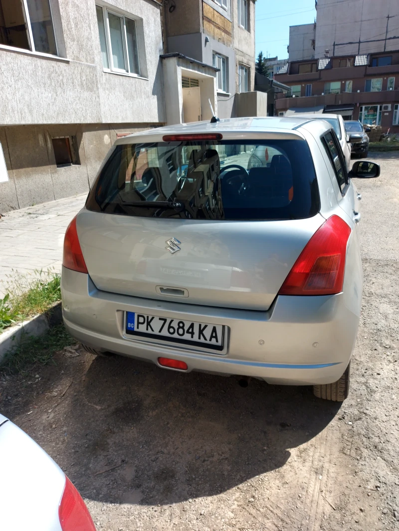 Suzuki Swift 1.3бензин 4х4 , снимка 3 - Автомобили и джипове - 52662619