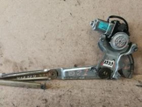 Стъклоповдигач преден ляв Kia Carnival Ii Ref.N.2533, снимка 1