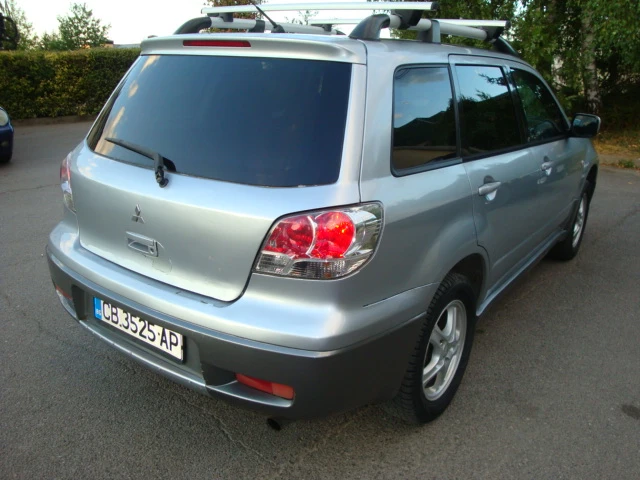 Mitsubishi Outlander 2.0 ГАЗ-БЕНЗИН 4Х4, снимка 11 - Автомобили и джипове - 46954226