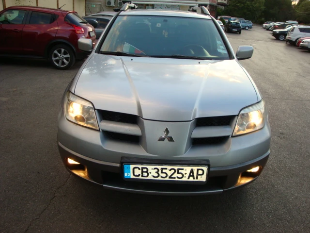 Mitsubishi Outlander 2.0 ГАЗ-БЕНЗИН 4Х4, снимка 8 - Автомобили и джипове - 46954226