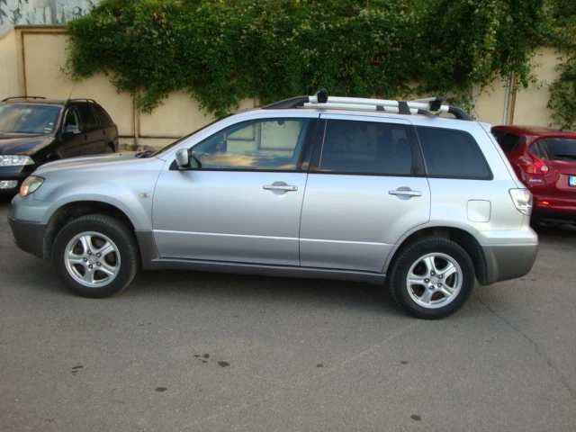 Mitsubishi Outlander 2.0 ГАЗ-БЕНЗИН 4Х4, снимка 9 - Автомобили и джипове - 46954226