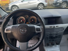 Opel Astra 2.0i turbo панорама NAVI 6-скорости face lift, снимка 11 - Автомобили и джипове - 44165753