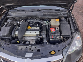 Opel Astra 2.0i turbo панорама NAVI 6-скорости face lift, снимка 14 - Автомобили и джипове - 44165753