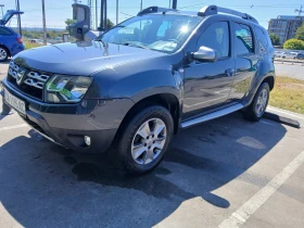     Dacia Duster 1.6i-4x4--