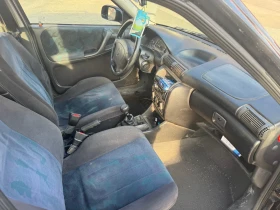 Opel Astra 1.8 ГАЗ/Бензин , снимка 13