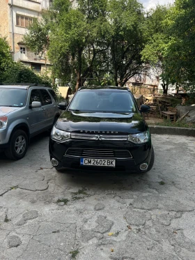 Обява за продажба на Mitsubishi Outlander 2.0 PHEV Plug-in Hybrid 4X4 FULL Pack ~18 500 лв. - изображение 1