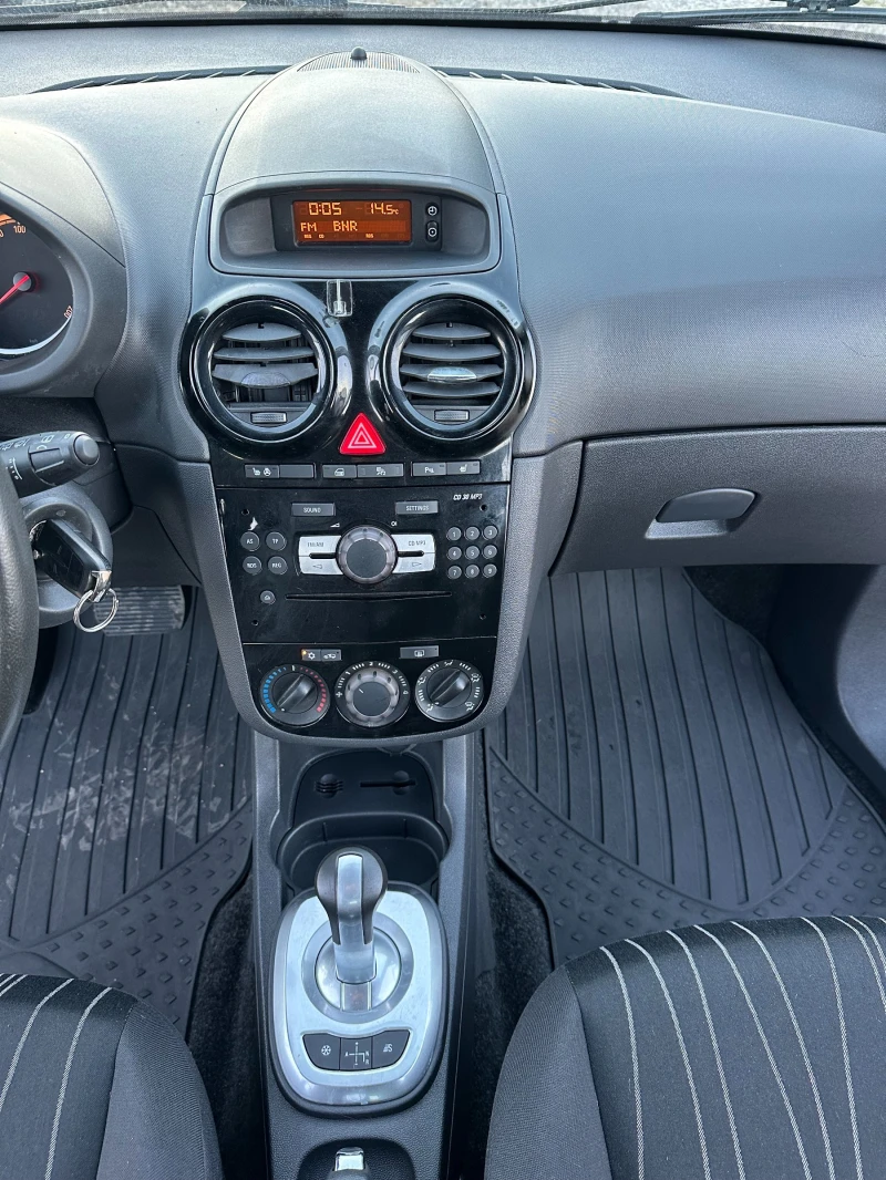 Opel Corsa 1.2i 86kc AUTOMAT 4ЦИЛИНДРИ, снимка 13 - Автомобили и джипове - 47679708