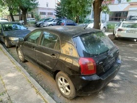 Toyota Corolla 1.6 vvti (e12), снимка 4