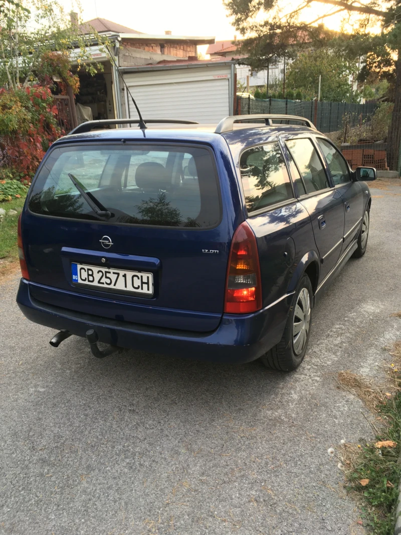 Opel Astra, снимка 12 - Автомобили и джипове - 52740600