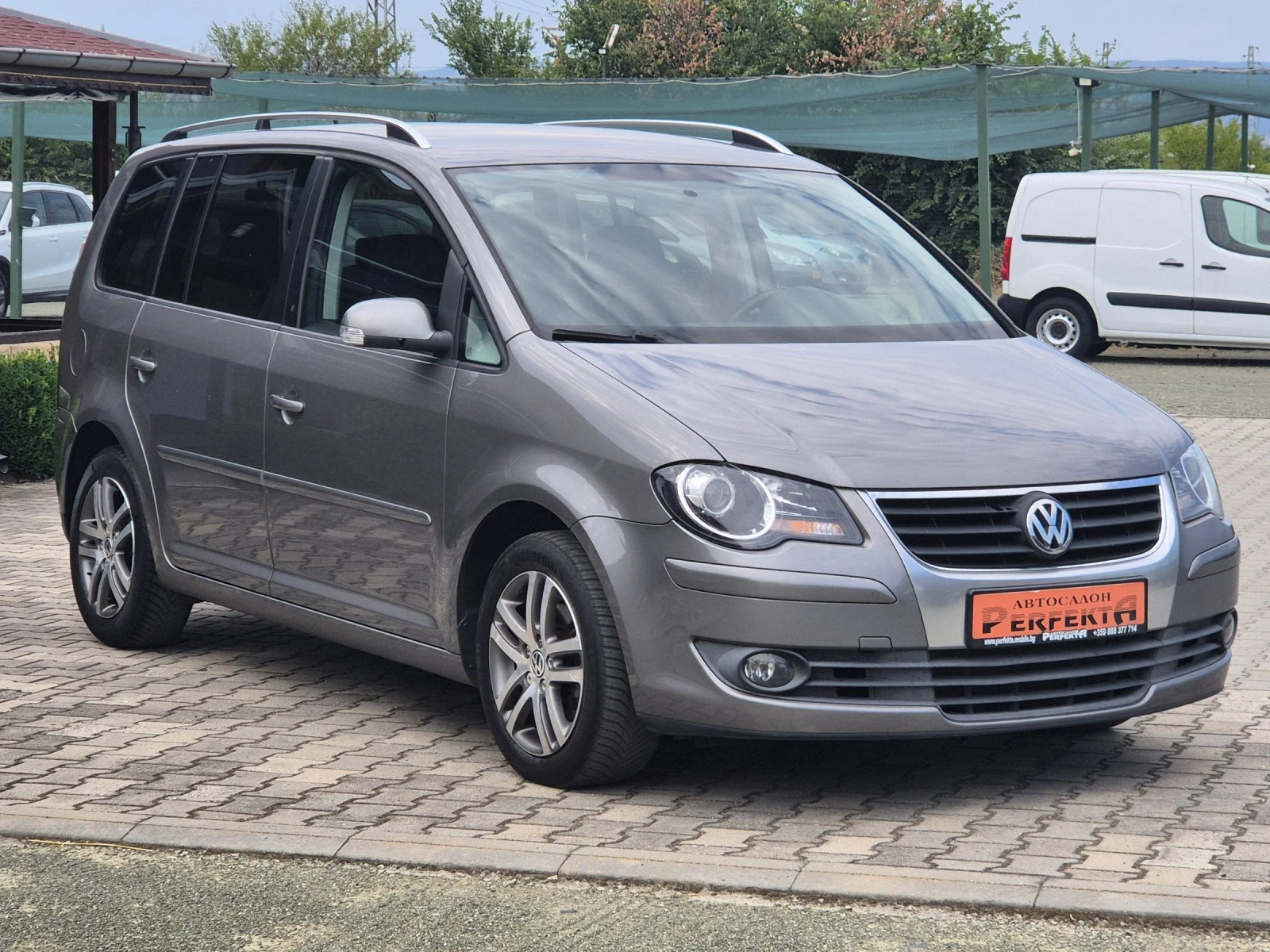 VW Touran 2.0TDI 140к.с - изображение 5