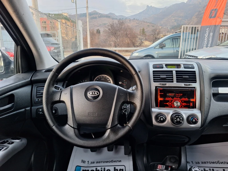 Kia Sportage 2.0 CRDI 4X4, снимка 11 - Автомобили и джипове - 48802416