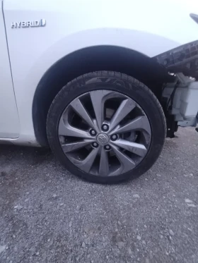Toyota Auris 1.8i-HYBRID на части - 10 € / 19.56 лв. - 49223478 8
