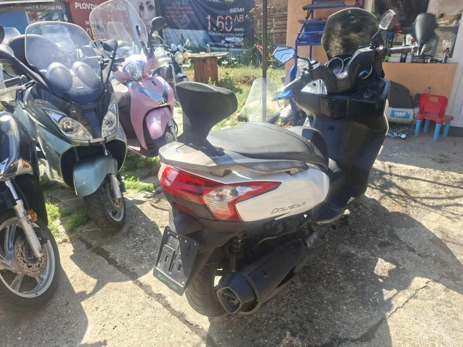 Kymco Downtown ABS 300ie 2011 год. Промоция  - изображение 5