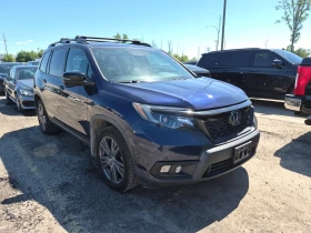 ����� �� �������� �� Honda Passport EX-L