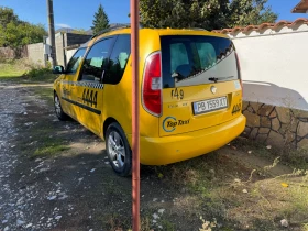Обява за продажба на Skoda Roomster 1.4 86кс ~4 500 лв. - изображение 1