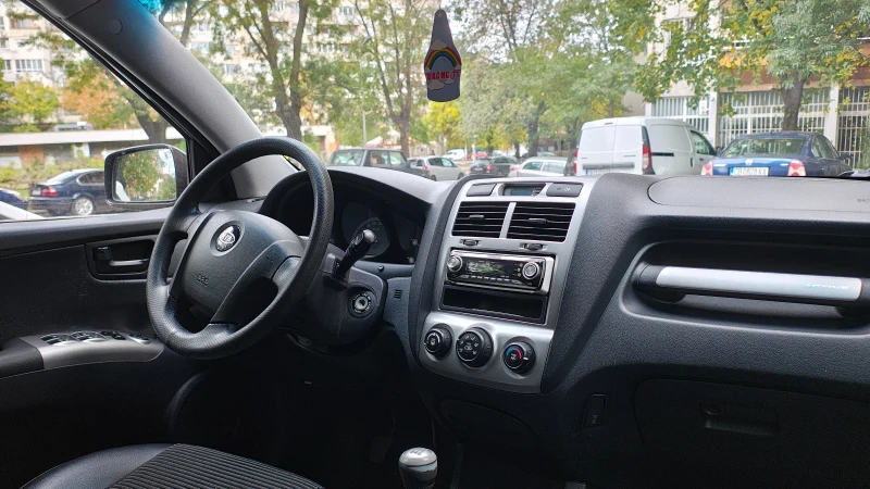 Kia Sportage, снимка 9 - Автомобили и джипове - 52429764