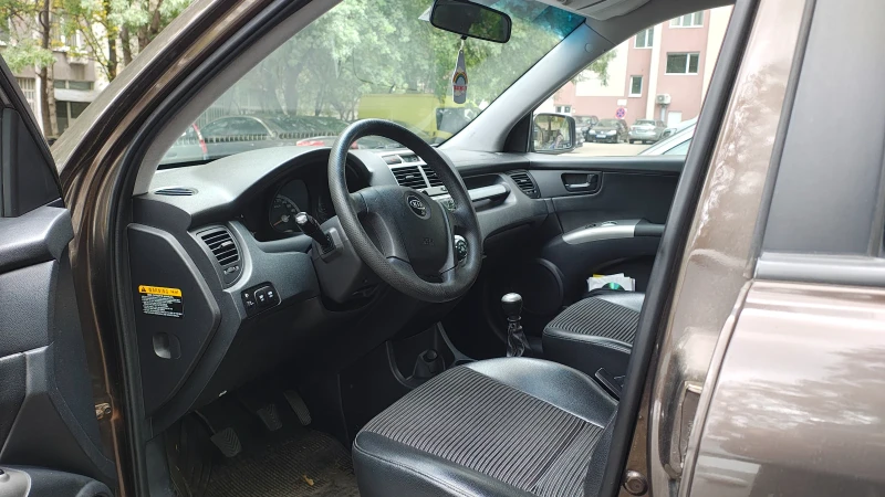 Kia Sportage, снимка 10 - Автомобили и джипове - 52429764