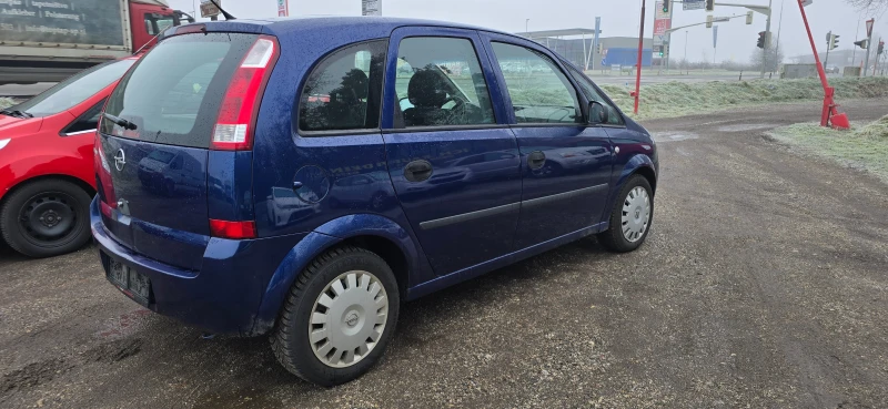 Opel Meriva 1.3cdti , снимка 6 - Автомобили и джипове - 48217772