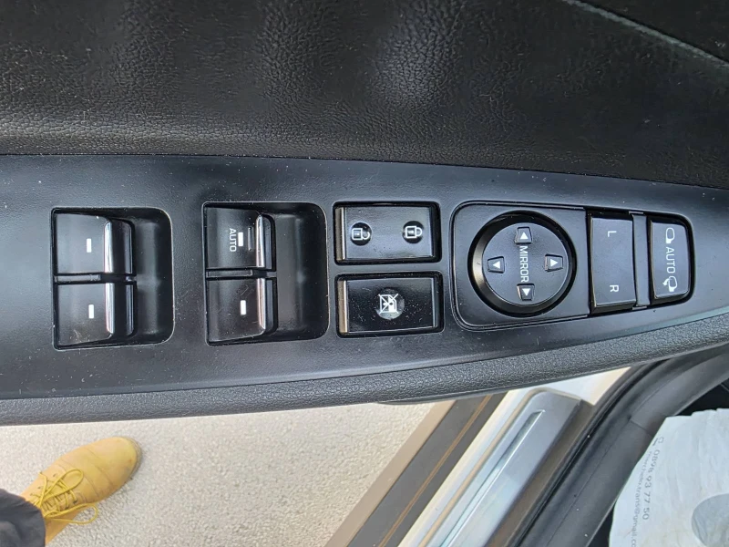 Hyundai Tucson 2.0 CRDi Executive 4 WD, снимка 16 - Автомобили и джипове - 52460058