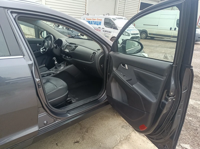 Kia Sportage 2.0crdi AWD, снимка 17 - Автомобили и джипове - 53445705