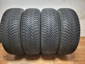 Гуми Зимни 245/65R17, снимка 1 - Гуми и джанти - 48013213